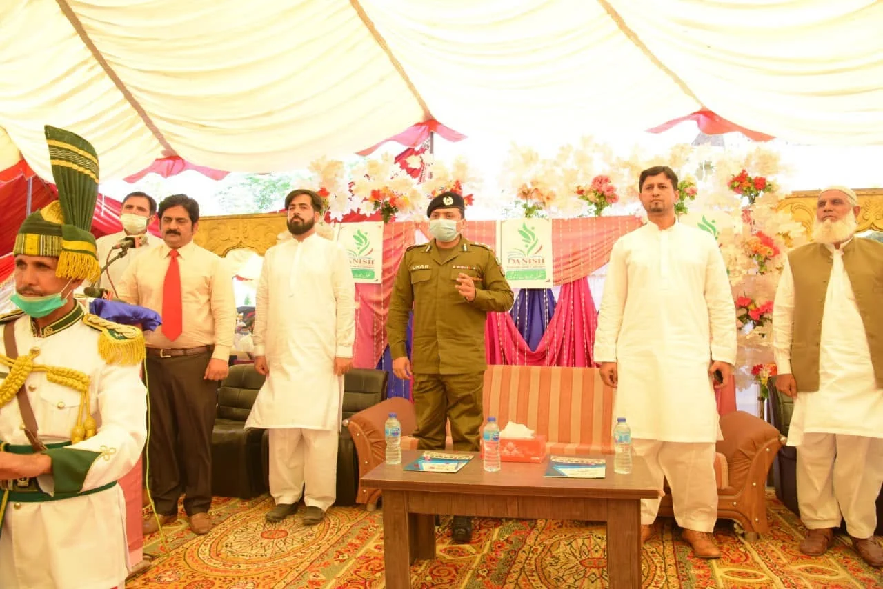 DPO Gujrat and school representatives during a ceremonial moment at Danish International Grammar School in October 2020.